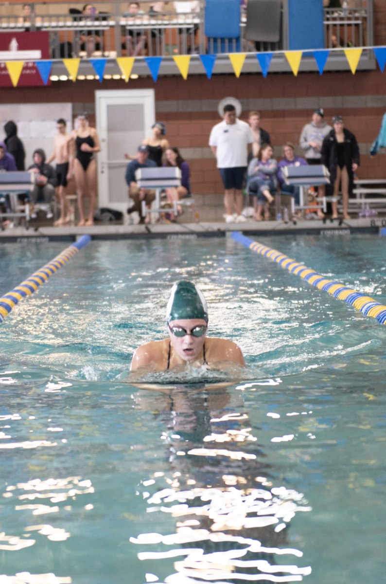 1.31.25 Junior Lucy Baker swimming breaststroke in the 200 IM. 